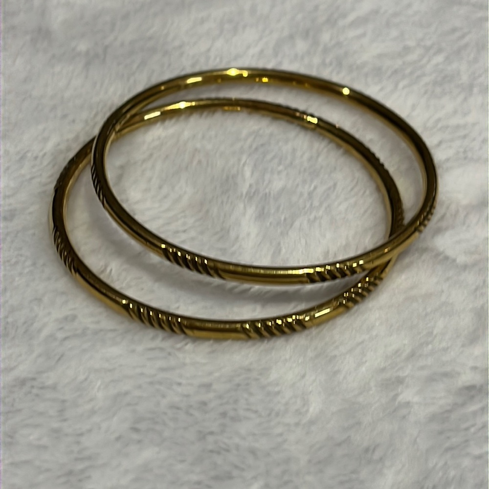 2 brass bangles.